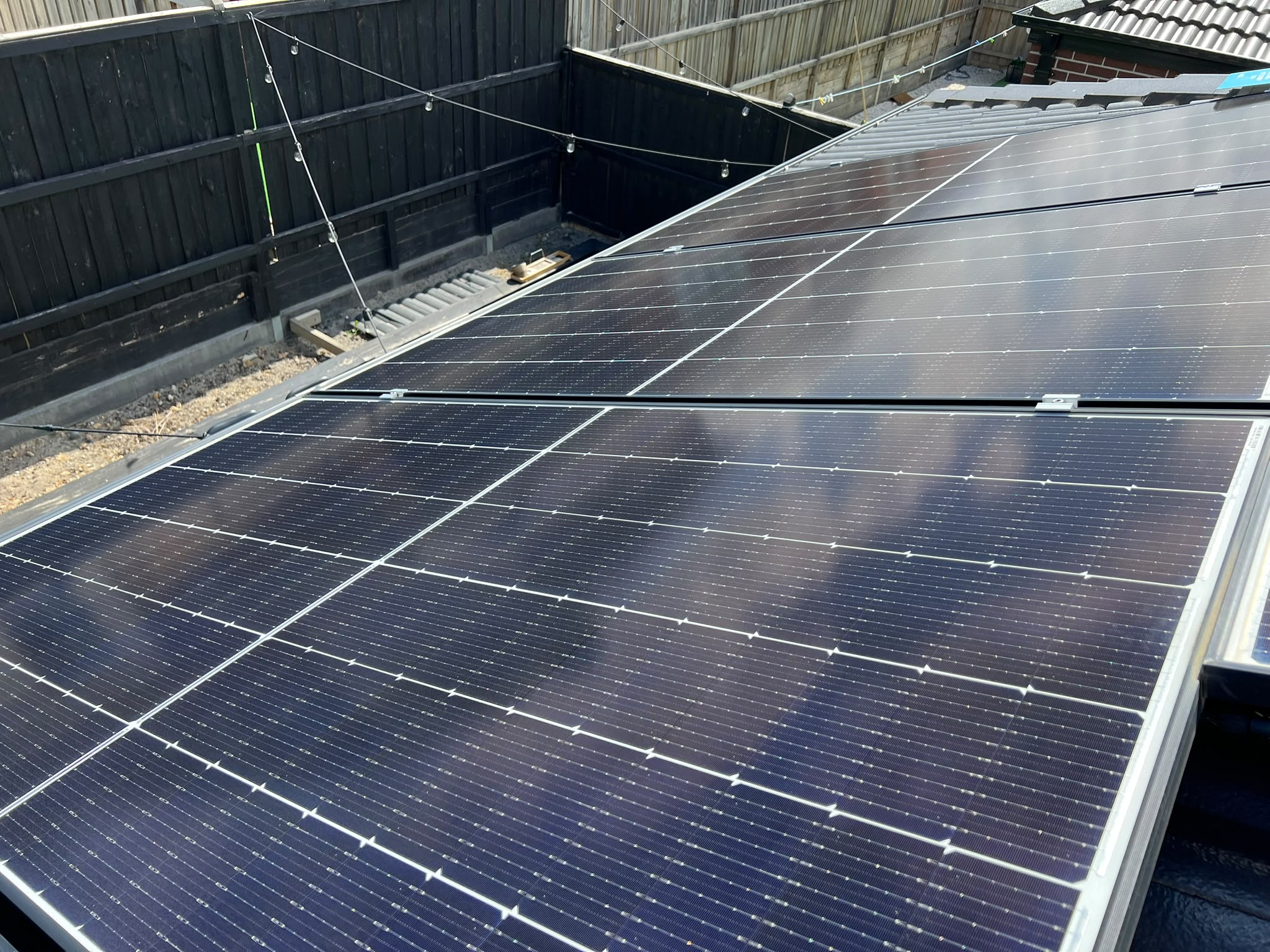 Clean rooftop solar panels after service