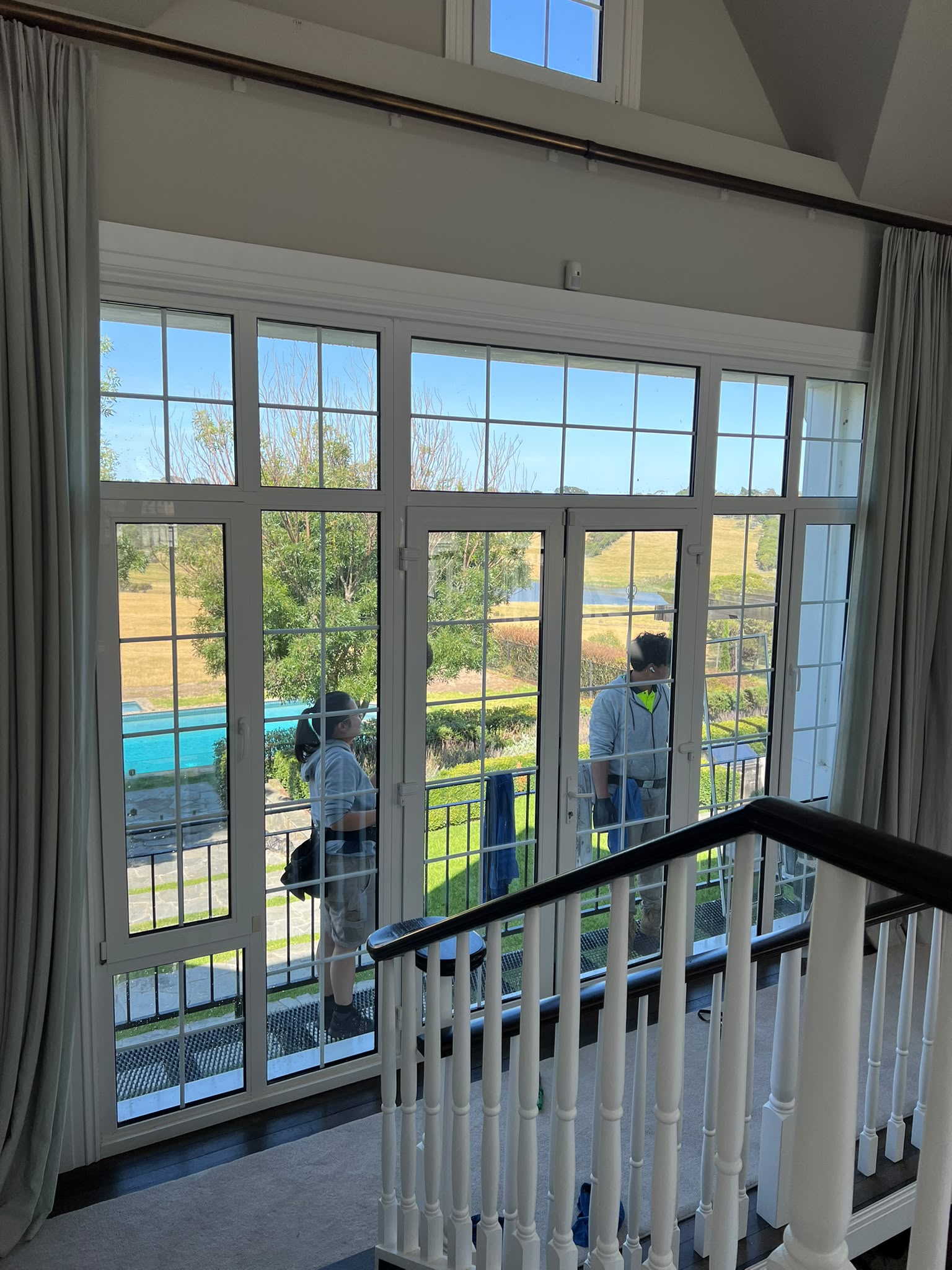 Traditional multi-pane windows being cleaned by the Pristine Sheen team